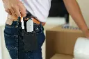 10490-slice-lifestyle-man-moving-box-opening-tool-holster-bubble-wrap-25.webp